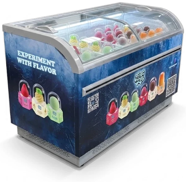 A branded Frost Lab chest freezer with a glass lid, stocked with fruit-shaped frozen desserts